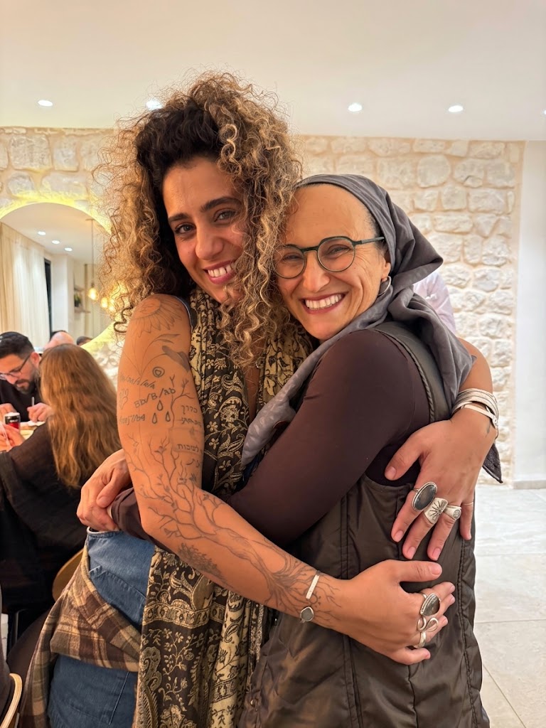 Jen Airley embracing her daughter Nova